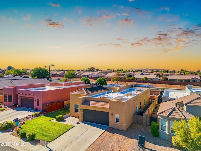 aerial view at dusk with a residential view