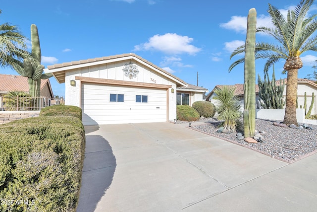 ranch-style home featuring a garage