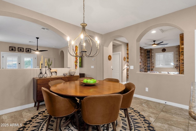 dining area featuring a healthy amount of sunlight, baseboards, and visible vents