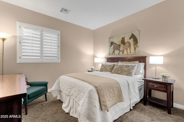 bedroom featuring carpet floors, baseboards, and visible vents