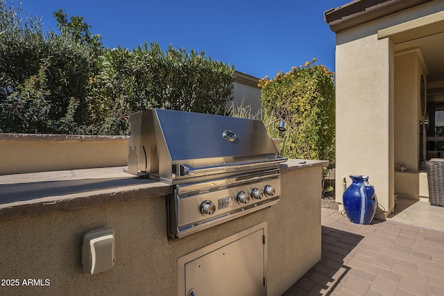 view of patio with grilling area and area for grilling