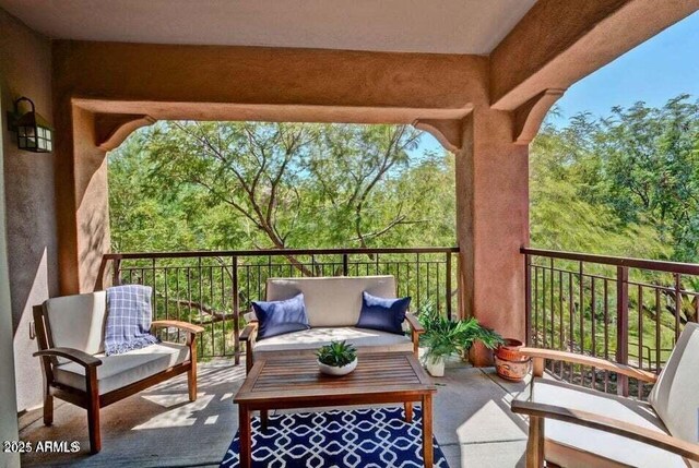 3935 E Rough Rider Rd Unit 1360, Phoenix, AZ 85050 - balcony featuring an outdoor hangout area