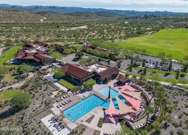 bird's eye view with a mountain view