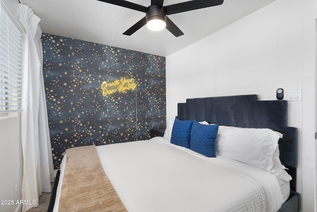 carpeted bedroom with ceiling fan