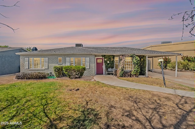 1712 E Montebello Ave, Phoenix, AZ 85016 - ranch-style home featuring a yard and a carport