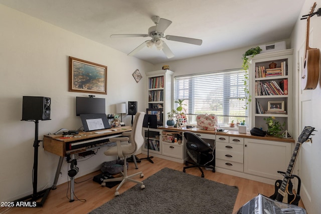 1712 E Montebello Ave, Phoenix, AZ 85016 - office area with light wood-style floors and a ceiling fan