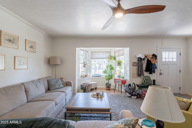 1712 E Montebello Ave, Phoenix, AZ 85016 - living room featuring wood finished floors, crown molding, ceiling fan, and baseboards