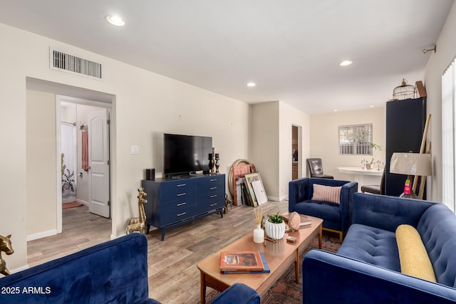 4832 E Cambridge Ave, Phoenix, AZ 85008 - living area with light wood-type flooring, recessed lighting, and baseboards