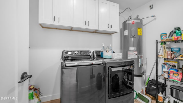 1717 W Roma Ave, Phoenix, AZ 85015 - laundry area featuring washing machine and clothes dryer, electric water heater, and cabinet space