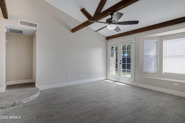 4165 E Huntington Dr, Phoenix, AZ 85040 - empty room with wood tiled floor, baseboards, lofted ceiling with beams, and visible vents