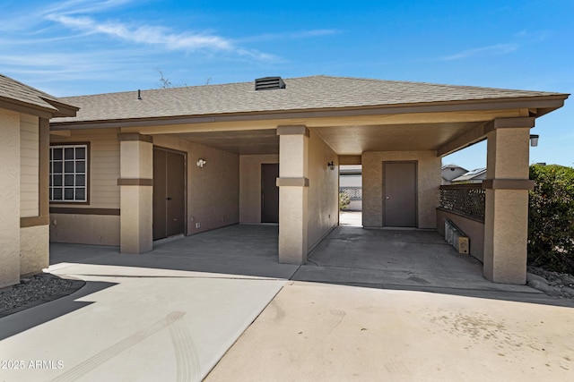 4165 E Huntington Dr, Phoenix, AZ 85040 - entrance to property with a patio area, stucco siding, and roof with shingles