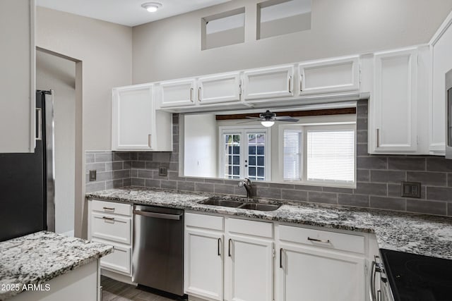 4165 E Huntington Dr, Phoenix, AZ 85040 - kitchen with stainless steel appliances, a sink, backsplash, and ceiling fan