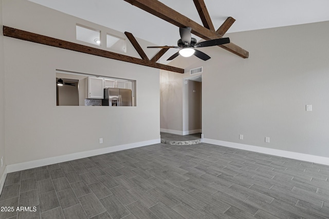 4165 E Huntington Dr, Phoenix, AZ 85040 - spare room featuring a ceiling fan, visible vents, baseboards, dark wood-style floors, and beam ceiling