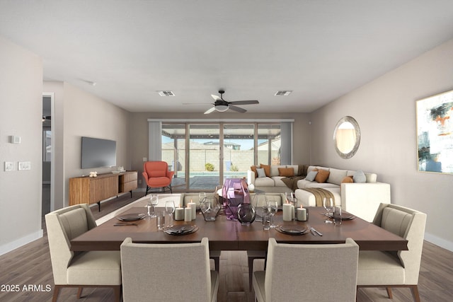 dining area featuring ceiling fan and dark hardwood / wood-style flooring