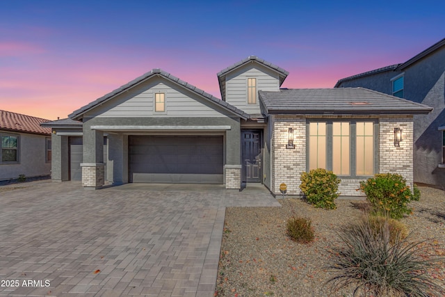 view of front of property featuring a garage