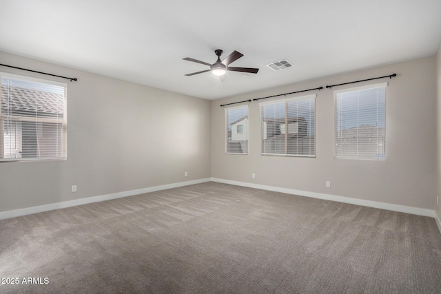 carpeted empty room with ceiling fan