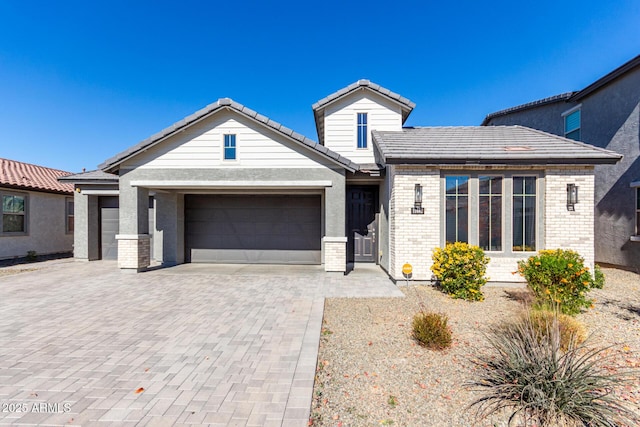 view of front of property with a garage