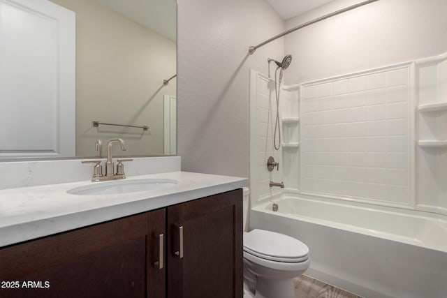 full bathroom featuring vanity, shower / washtub combination, and toilet