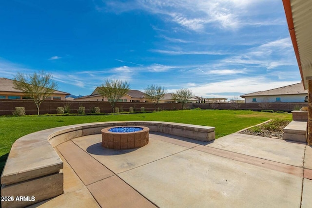 view of patio / terrace featuring a fire pit