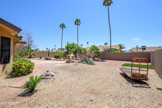 view of yard with a patio and a fenced backyard