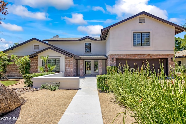 view of front of home with a garage