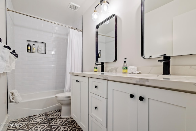 full bathroom with shower / bath combination with curtain, vanity, and toilet