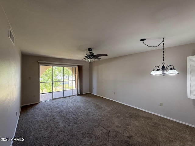 131 N Higley Rd Unit 215, Mesa, AZ 85205 - empty room with dark colored carpet, a ceiling fan, and a chandelier
