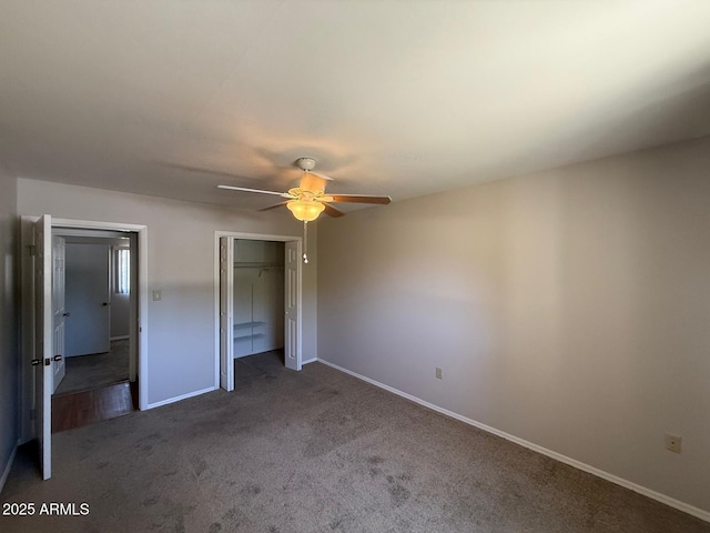 131 N Higley Rd Unit 215, Mesa, AZ 85205 - unfurnished bedroom featuring carpet flooring, a closet, and ceiling fan