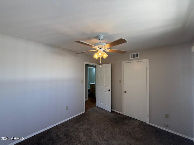 131 N Higley Rd Unit 215, Mesa, AZ 85205 - unfurnished bedroom with carpet flooring and a ceiling fan