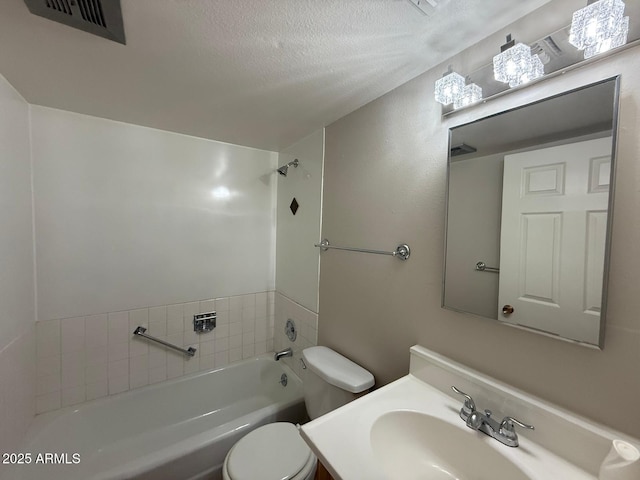 131 N Higley Rd Unit 215, Mesa, AZ 85205 - bathroom featuring shower / bath combination, vanity, and a textured ceiling
