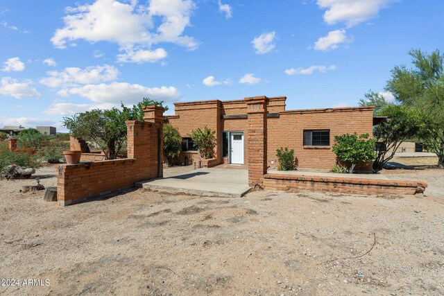 view of front facade with a patio