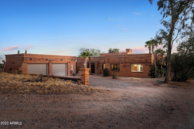 view of front of home featuring a garage