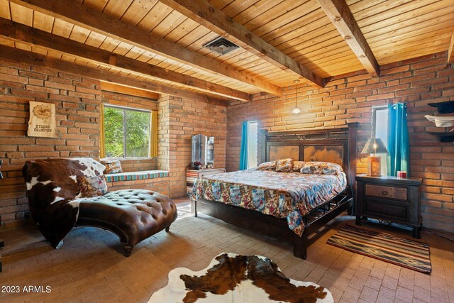 bedroom featuring wood ceiling, brick wall, and beamed ceiling