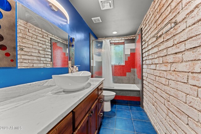 full bathroom featuring brick wall, vanity, toilet, and shower / bath combination with curtain