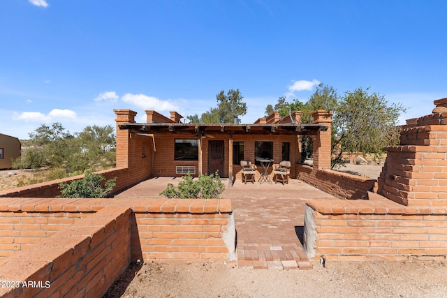 view of front facade featuring a patio area