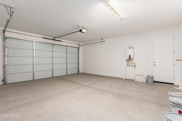 garage with a garage door opener and tankless water heater