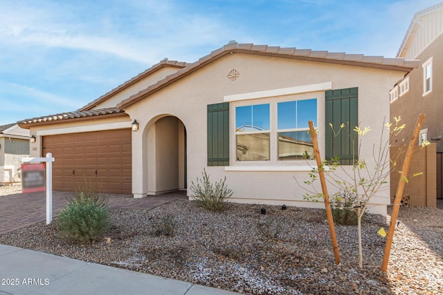 view of front of property with a garage