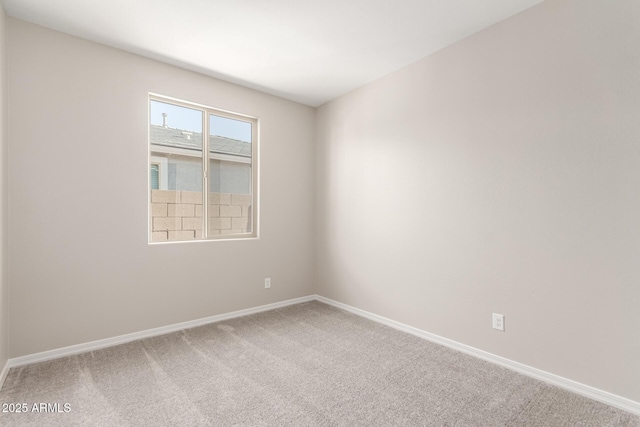 empty room with carpet flooring