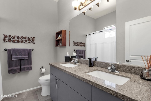 10359 E Los Lagos Vista Ave, Mesa, AZ 85209 - bathroom with toilet, double vanity, tile patterned floors, baseboards, and curtained shower