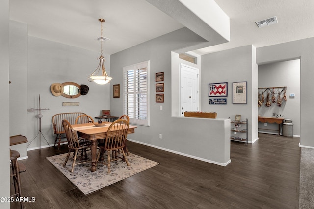 10359 E Los Lagos Vista Ave, Mesa, AZ 85209 - dining area with dark wood finished floors and baseboards