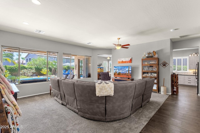 10359 E Los Lagos Vista Ave, Mesa, AZ 85209 - living area featuring a ceiling fan, baseboards, recessed lighting, and wood finished floors