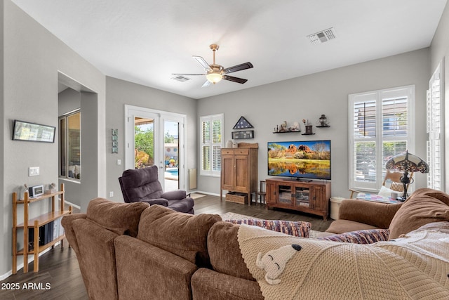 10359 E Los Lagos Vista Ave, Mesa, AZ 85209 - living area with ceiling fan, dark wood-style flooring, and baseboards