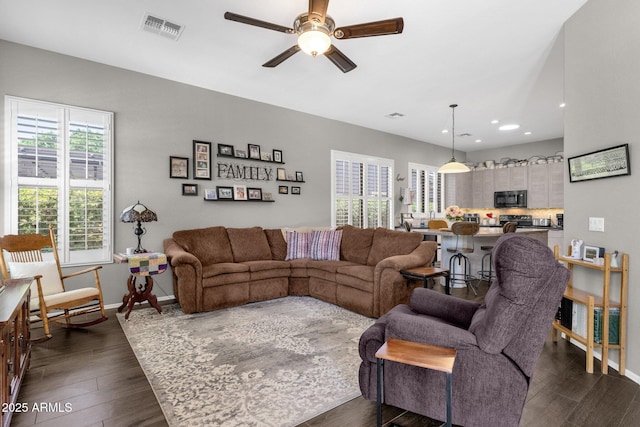 10359 E Los Lagos Vista Ave, Mesa, AZ 85209 - living area with a ceiling fan, baseboards, dark wood-type flooring, and recessed lighting