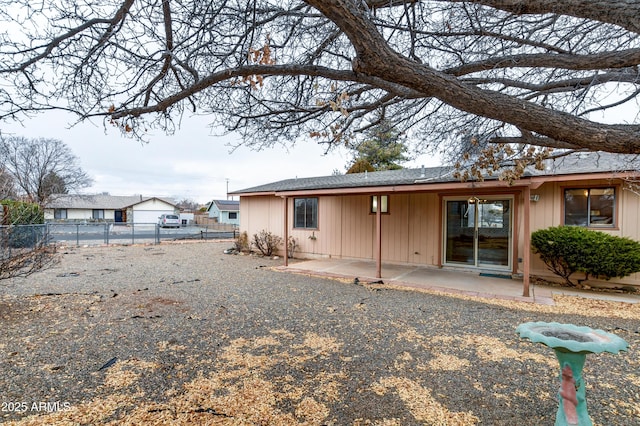 back of property featuring a patio area