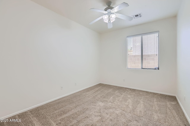 6815 W Carter Rd, Laveen, AZ 85339 - carpeted empty room featuring a ceiling fan and baseboards