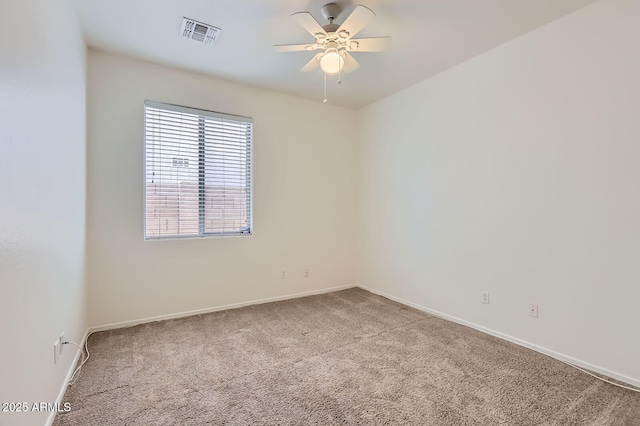 6815 W Carter Rd, Laveen, AZ 85339 - unfurnished room with carpet, a ceiling fan, and baseboards