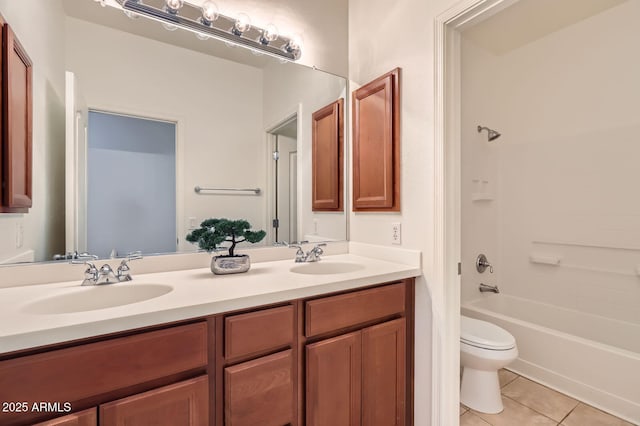 6815 W Carter Rd, Laveen, AZ 85339 - full bathroom featuring tile patterned flooring, toilet, double vanity, and bathing tub / shower combination