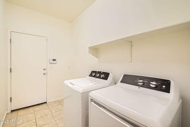 6815 W Carter Rd, Laveen, AZ 85339 - laundry area featuring independent washer and dryer, light tile patterned floors, and baseboards