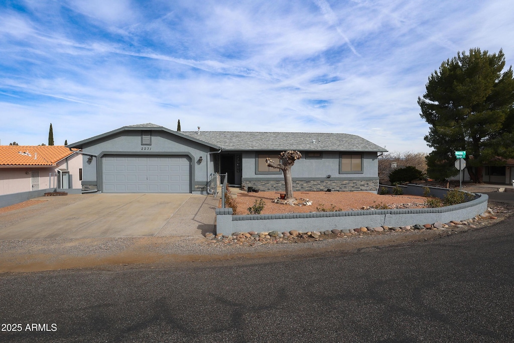 view of front of home featuring a garage