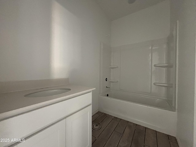 bathroom featuring vanity and shower / tub combination